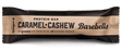 Barebells Caramel Cashew protein bar packaging on a black background