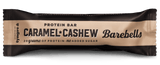 Barebells Caramel Cashew protein bar packaging on a black background