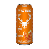 A can of Bucked Up Protein RTD Drink labeled as 'Orange Cream' flavor, and indicating 25g of protein, 0g sugar, and 0g fat.