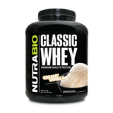 A 5 pound container of NutraBio Classic Whey protein supplement with Creamy Vanilla flavor