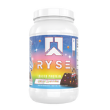 A container of RYSE Loaded Whey Protein Powder in the flavor Cosmic Brownies 