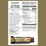 Barebells Salty Peanut protein bar with nutrition label on a gold background