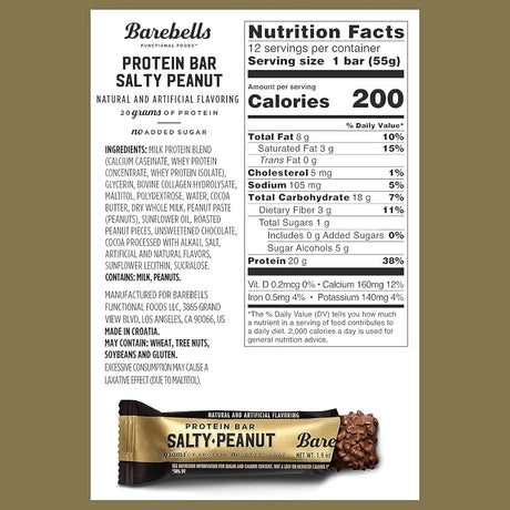 Barebells Salty Peanut protein bar with nutrition label on a gold background